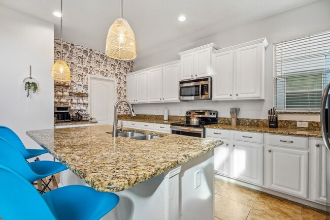 Building Photo - 8964 Bismarck Palm Rd