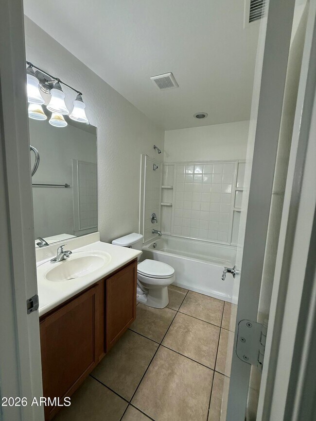 Building Photo - 8460 W Lewis Ave