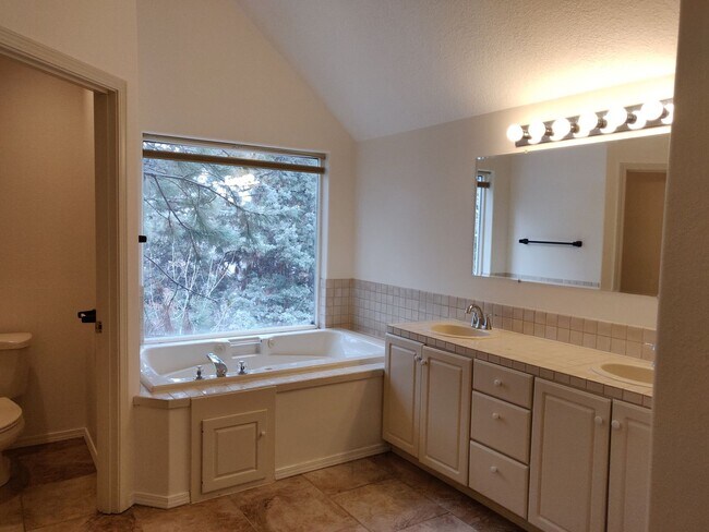 Building Photo - Spacious and charming, this two-story 4 be...