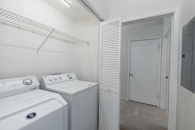 Building Photo - Refurbished upstairs two bedroom in well maintained East side gated complex