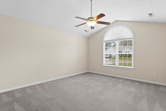 Building Photo - House with Fenced Back Yard Available!