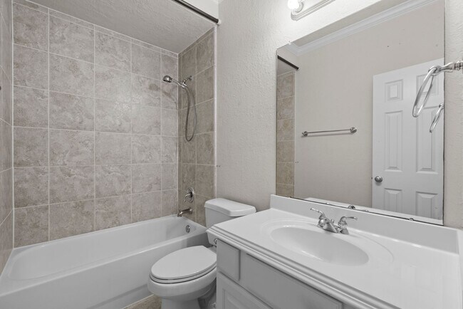 Building Photo - Luxury Townhome with Attached Garage & Outdoor Entertaining Area - $100 off first and second mont!