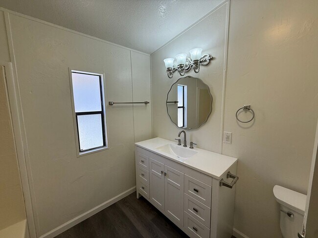 Building Photo - Large Remodeled Doublewide with 2 Car Garage.