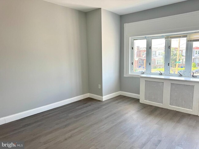 Building Photo - 2128 W 65th Ave