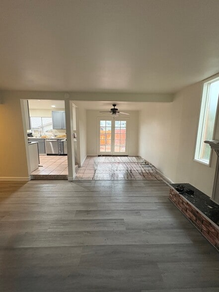 Continuing to the left across the living room is the dining room - 23162 Smith Rd