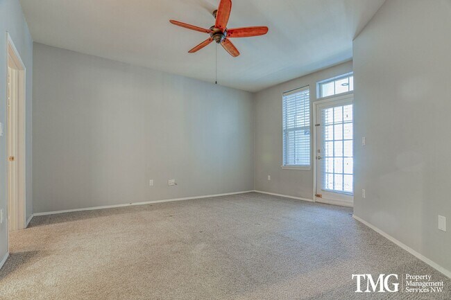 Building Photo - Spacious Ground-Level 2BD Condo with Garage & Resort-Style Amenities