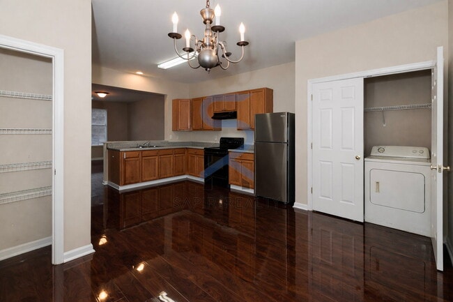 Building Photo - Move in before February 28th and choose your reward: a $250 Amazon Gift Card or a 55" Smart TV!