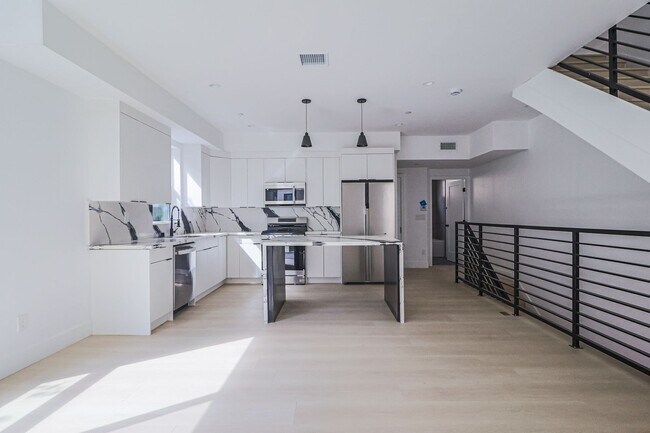 Building Photo - NEW CONSTRUCTION LUXURY 4 BED TOWNHOMES WITH ROOF DECKS