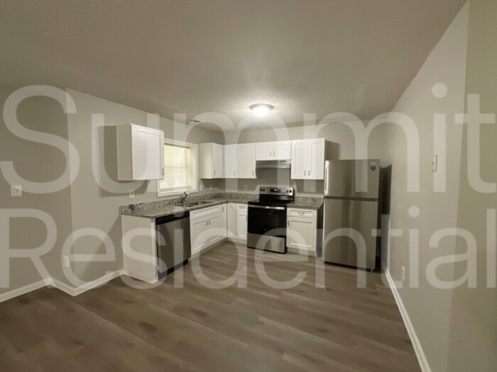 Building Photo - 7189 Ravenwood Ln