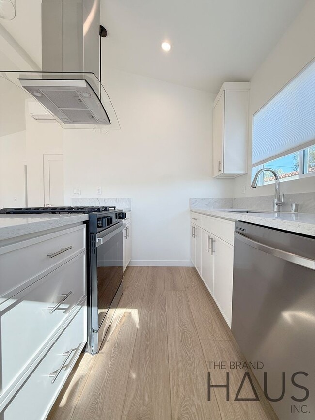 Building Photo - Brand-New 1-Bedroom, 1-Bathroom, 1-Compact Carport - Vaulted Ceilings in Belmont Heights