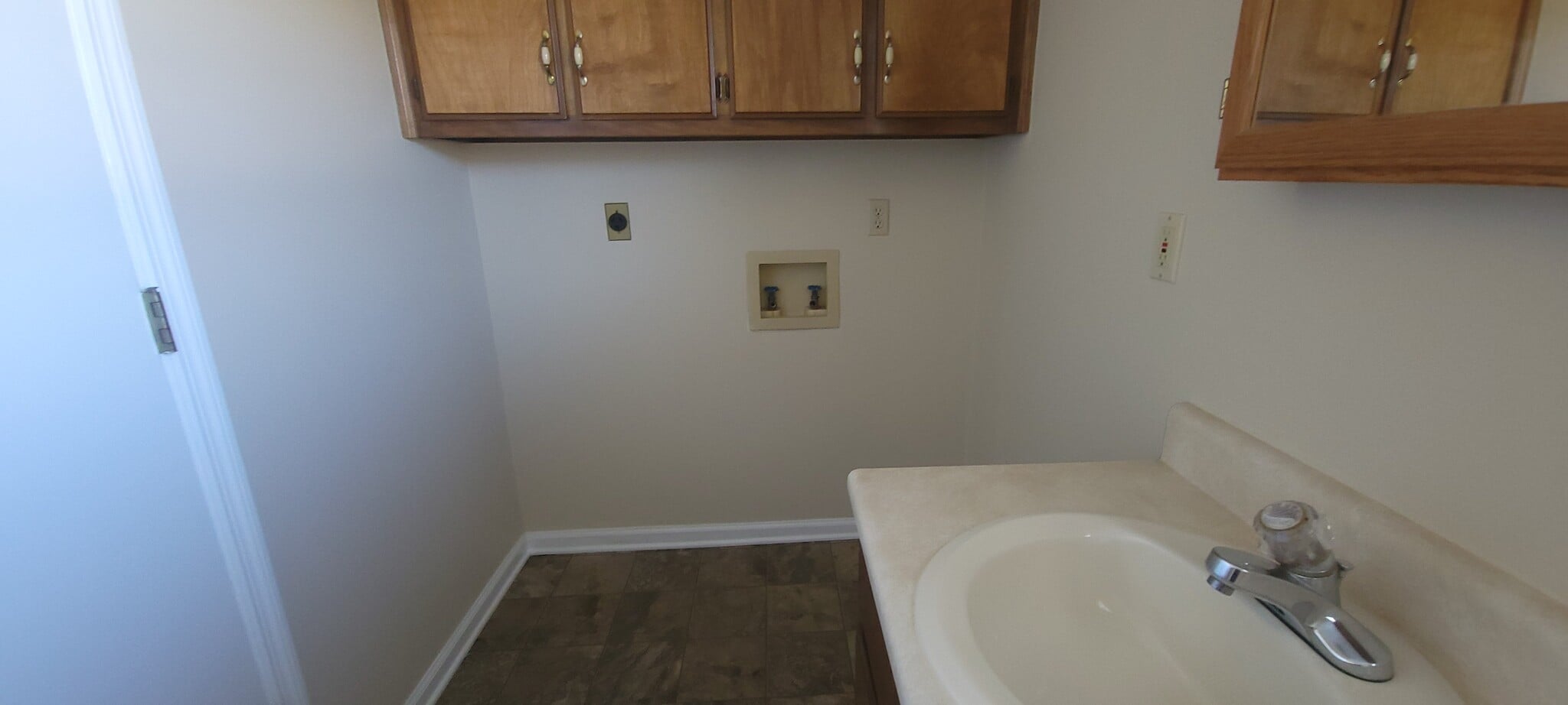 Washer/dryer connections in bathroom - 25585 Nick Davis Rd