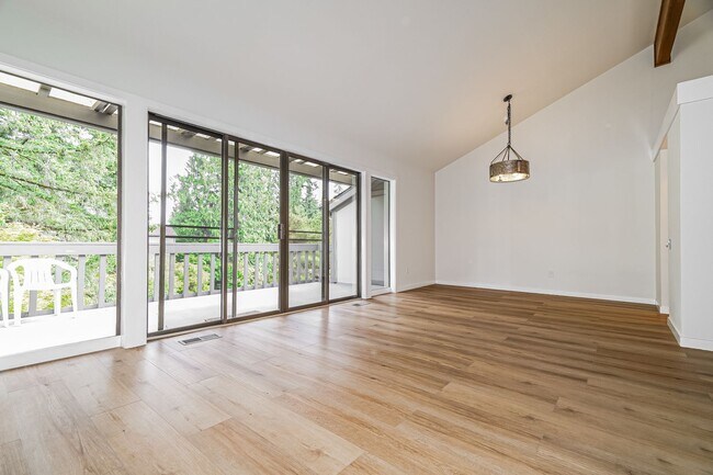 Building Photo - Top-Floor Condo with Forest Views, Large Private Deck & Resort-Style Amenities