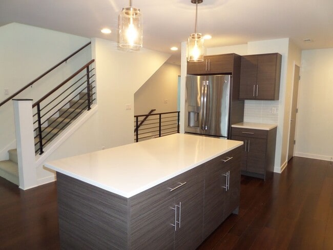 Building Photo - Immaculate and LARGE 4-Bedroom Home in Unb...