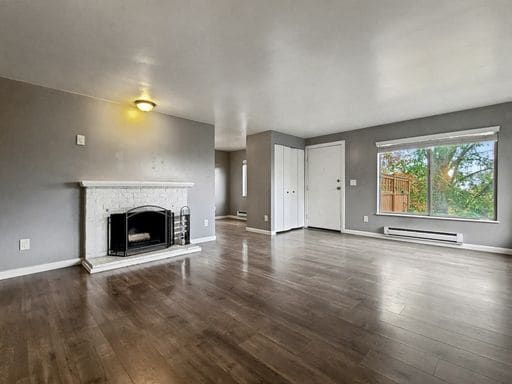 Building Photo - AVAILABLE NOW! Charming West Seattle Home featuring a garage, spacious deck, and wood-burning fir...