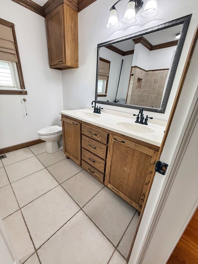 Building Photo - Charming West Tulsa Bungalow with Detached Garage and Hardwood Floors