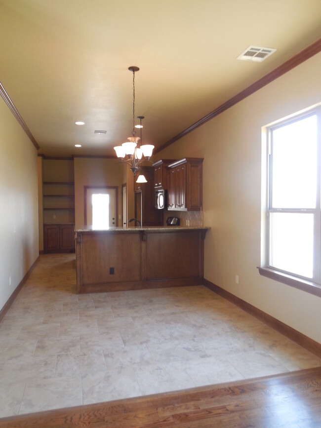 Building Photo - Fully Furnished Three Bedroom, Two Bathroo...
