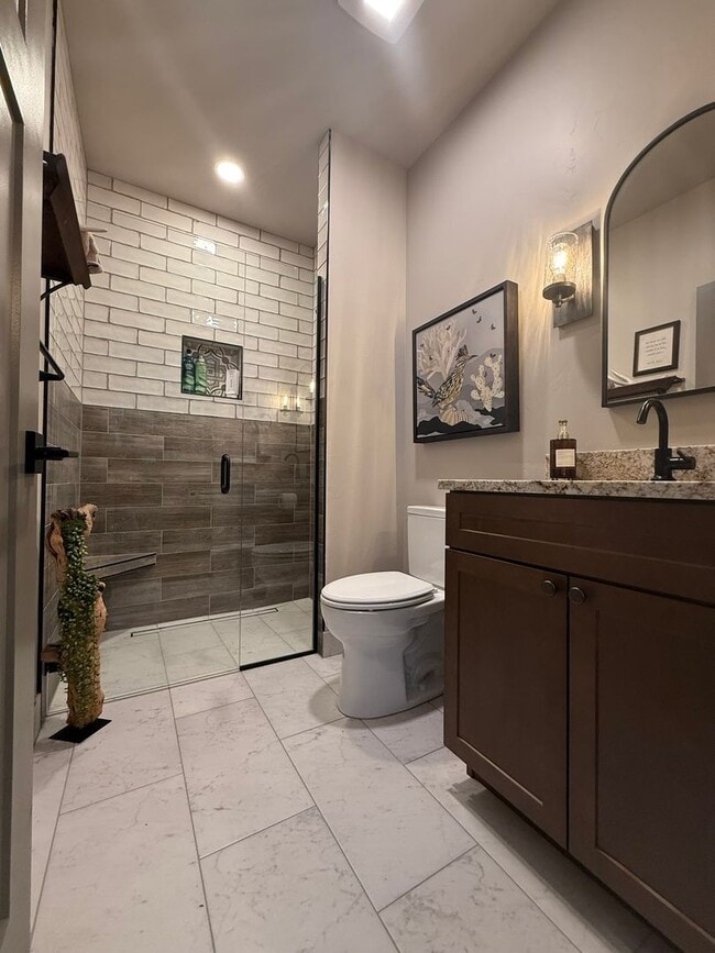 Building Photo - Your Private Oasis Awaits: Spacious 4BR Home with Premium Amenities