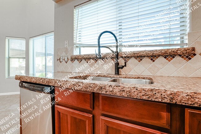 Building Photo - 14958 W Cameron Dr