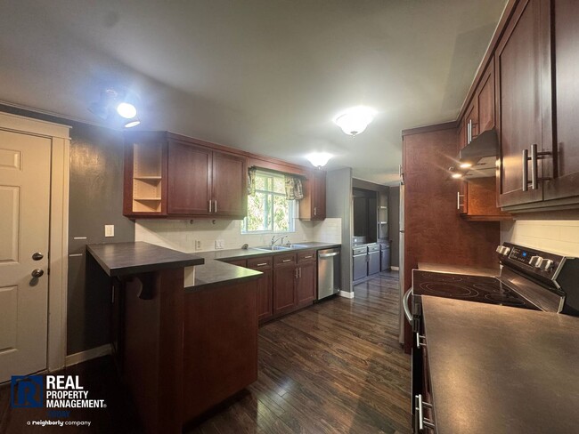 Building Photo - 2 Bed / 2 Bath Home with 4-Car Garage, Large Yard & RV Parking in Graham!