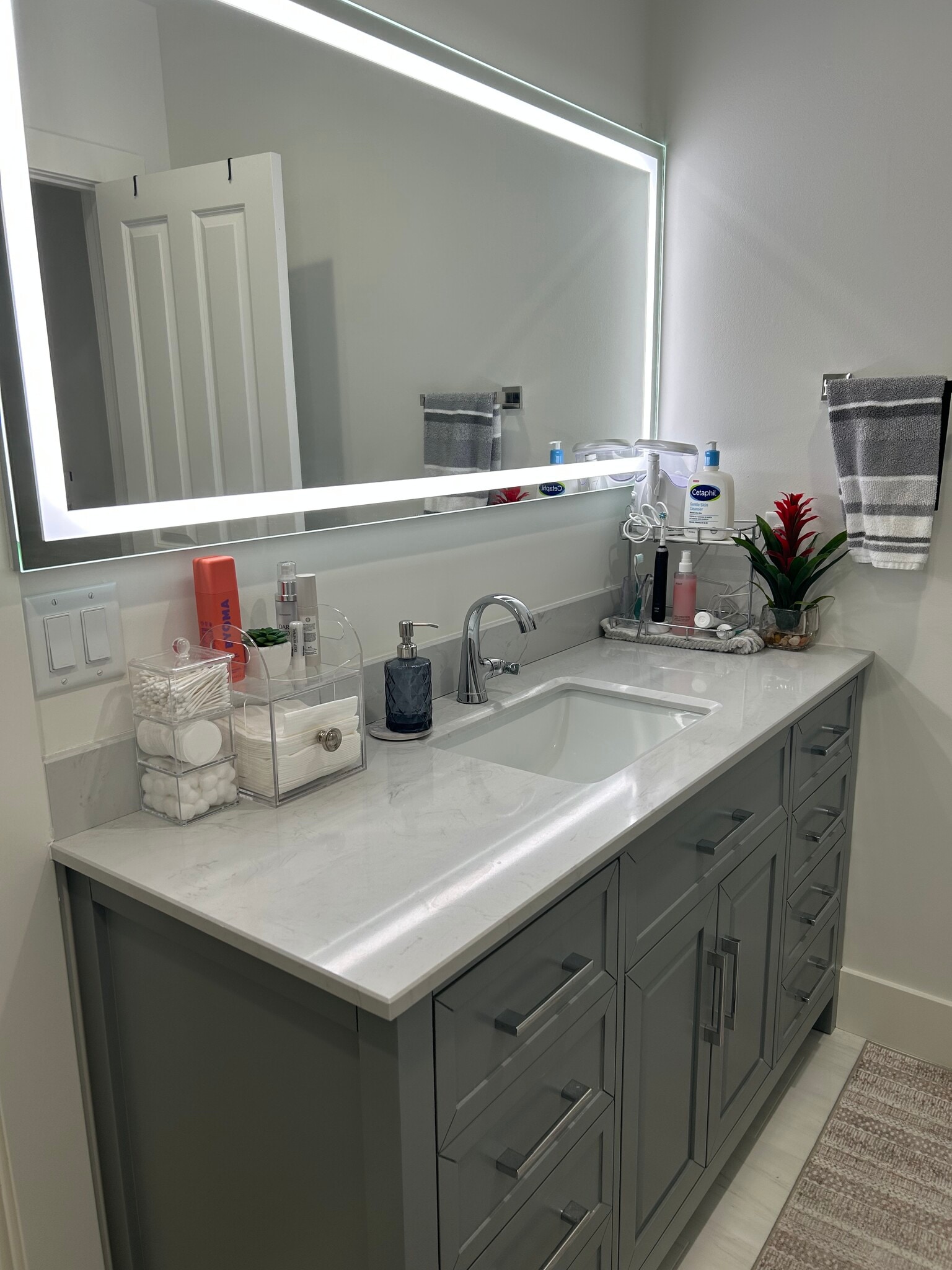 Bathroom sink with lighted mirror - 11452 S Marco Polo Ln