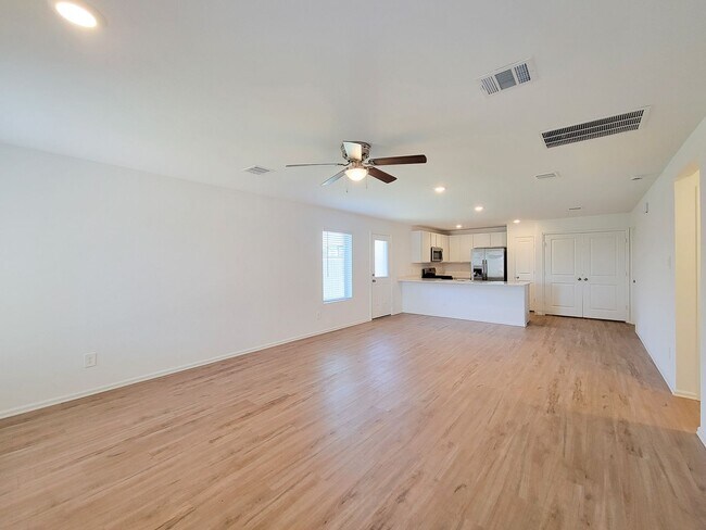 Building Photo - This single-story home has a comfortable layout with three bedrooms and a living area all on one ...