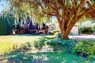 Building Photo - Lovingly cared for 3-bedroom, 1.75-bath ra...