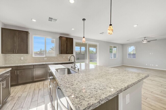 Building Photo - Gated community Located within the Valley Vista Master Plan. 4 Bed 3 Bath features and Open and i...