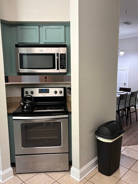Built in Microwave and Stainless Oven with Electric Cook top - 3218 Veterans Memorial Pky