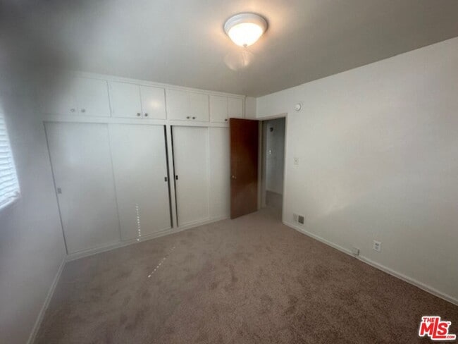 Building Photo - 5128 W Slauson Ave