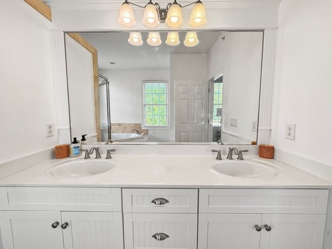 Building Photo - Fully Furnished Waterfront Elegance on Mai...