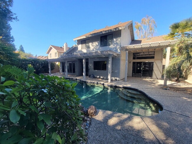 Building Photo - "Spacious 4-Bed, 3-Bath Oasis in Gold River with pool!"