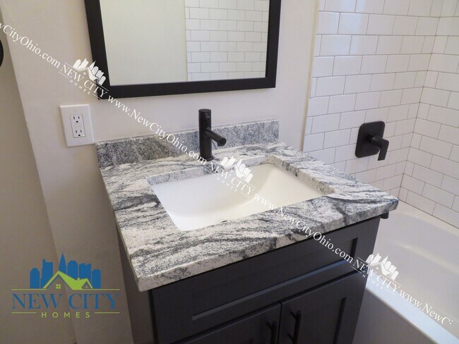 Building Photo - Newly Renovated Apartment Building