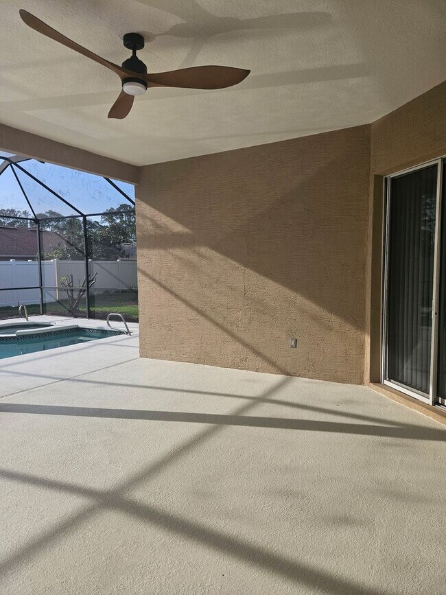 Building Photo - 4 BEDROOM 3 FULL BATH HOME WITH A SCREENED IN POOL IN THE BEAUTIFUL PALM COAST