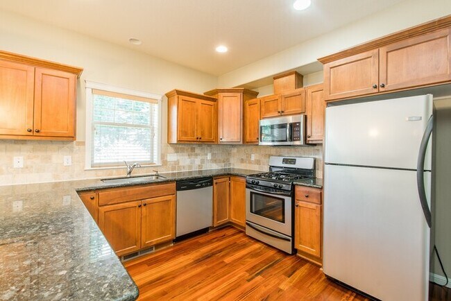 Building Photo - Spring Into Your New Home - Premium Corner Townhome Now Available!