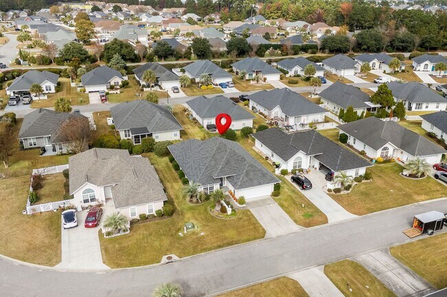 Building Photo - Live the Coastal Lifestyle in This Cypress Keys Beauty!