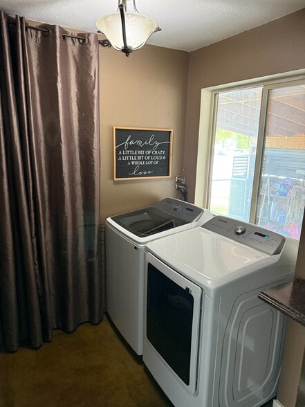 Laundry room in basement. - 3835 S Main St