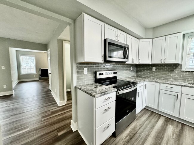 Building Photo - Updated & Ready For You NOW! A Pet-Friendly Home w/Attached Garage, All Appliances Convey - HUGE ...