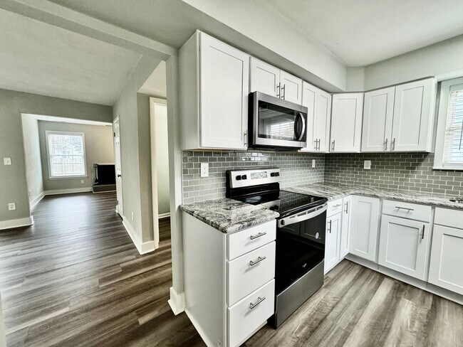 Building Photo - Updated & Ready For You On 12-05-25! A Pet-Friendly Home w/Attached Garage, All Appliances Convey...