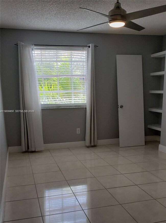 Building Photo - 18316 NW 68th Ave