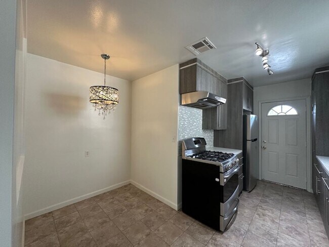 Building Photo - Completely remodeled and located on a quiet tree lines street in a beautiful pocket of Winnetka