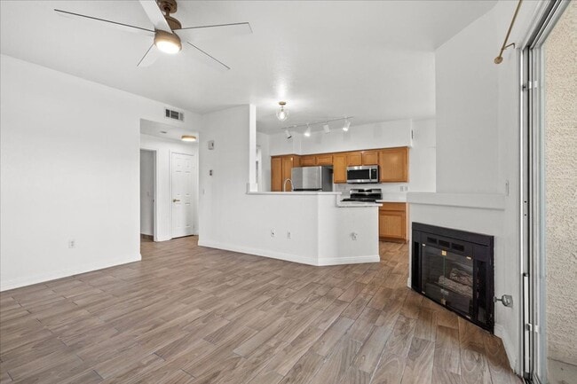 Building Photo - Charming 2-Bedroom First Floor Featuring Open Layout, Fireplace, Patio & Community Pool