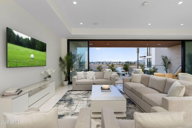 Building Photo - 6587 N Palmeraie Blvd