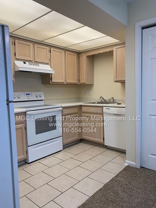 Building Photo - Welcome to Whispering Winds Townhomes – Wh...