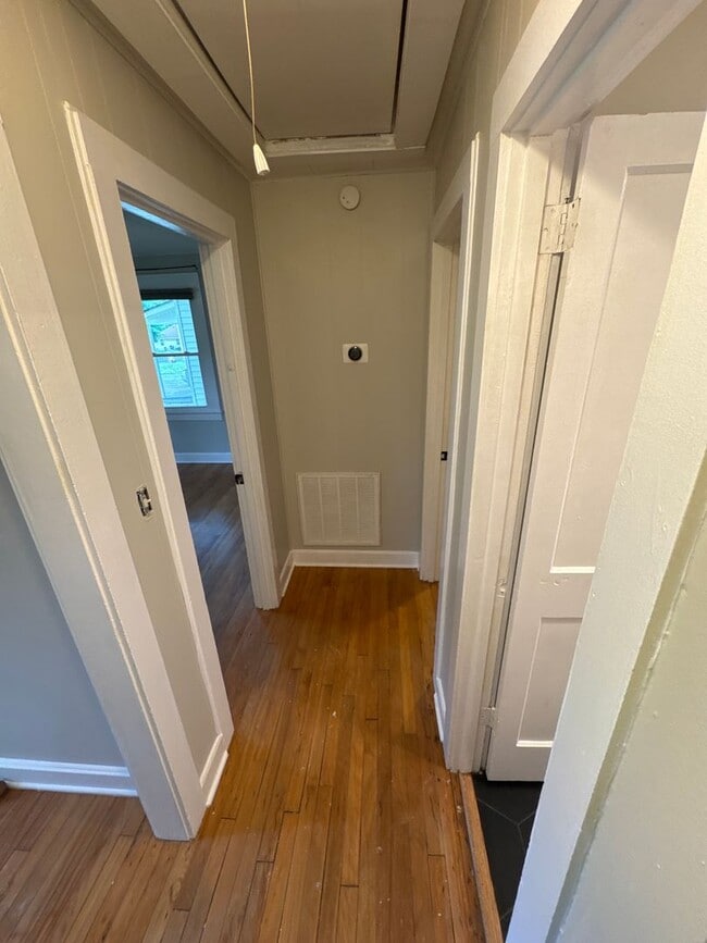 Building Photo - Classic charm meets modern comfort in this updated Madison cottage with a large backyard and conv...