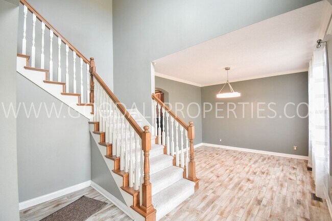 Building Photo - 4 Bedroom 4 Bath Executive Home in West Des Moines with a fenced in yard and a 3-car garage