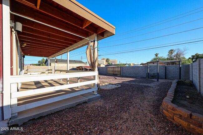 Building Photo - 6539 E Arbor Ave