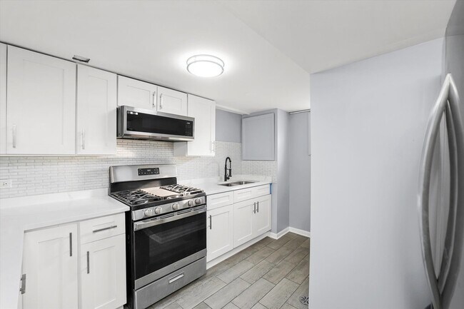 Building Photo - 3353 N Ozanam Ave