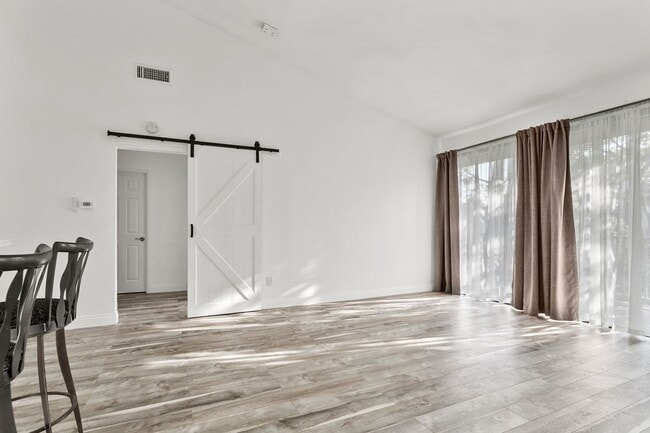 Building Photo - UPGRADED ONE BEDROOM OASIS IN GATED COMMUNITY