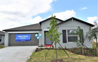 Building Photo - Like New 4 Bedroom Home