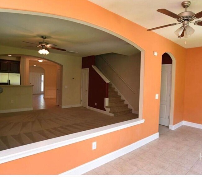 Building Photo - Townhome fresh paint and new carpet! Won't...